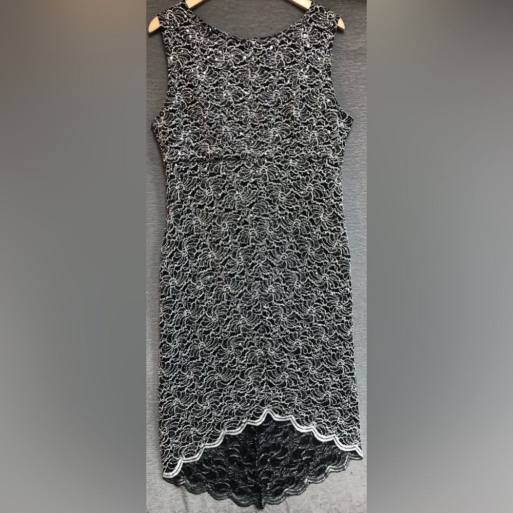 Blue sage, high, low sleeveless black dress with silver glitter floral design